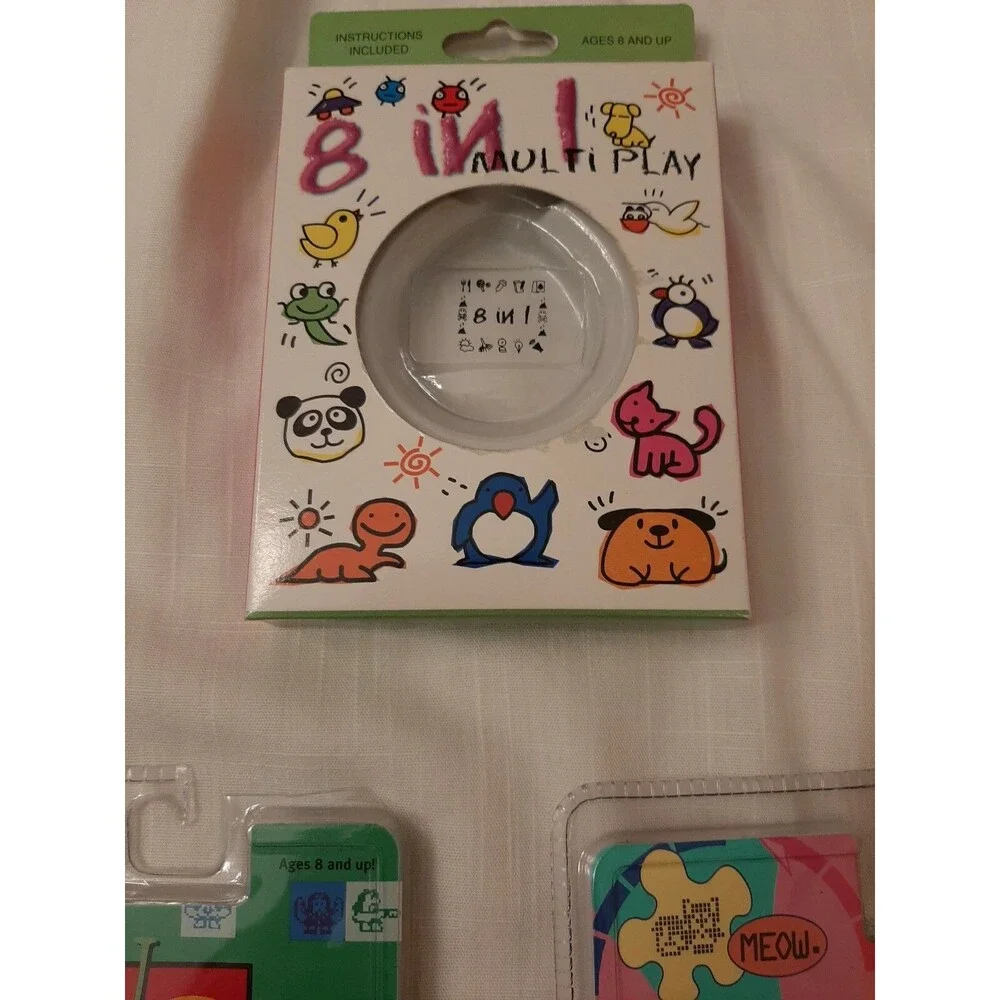 (4 EMPTY PACKAGES)1997 NANO FIGHTER SUPREME SUMO PLAYMATES MICRO PETS NANO KITTY